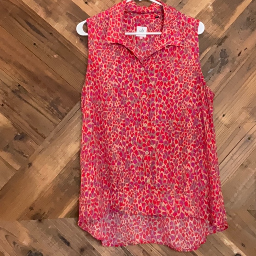 Hot pink sleeveless CAbi blouse.